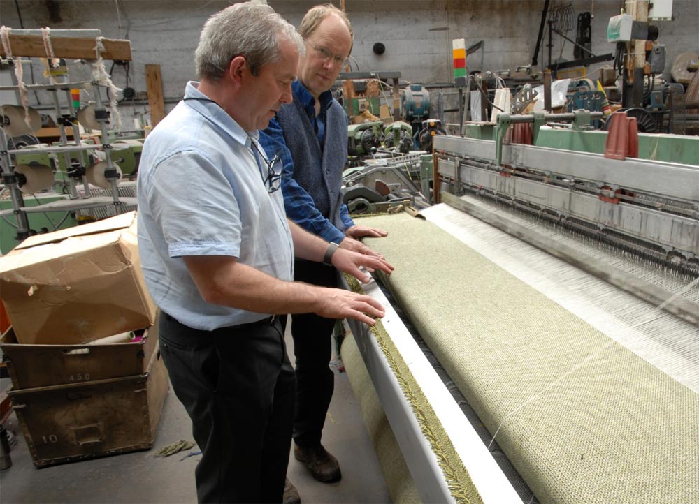 Gerry visiting our good friend & Master Weaver Andrew from the famous Kerry Woollen Mills to go through the weaving process of our stunning tweeds.