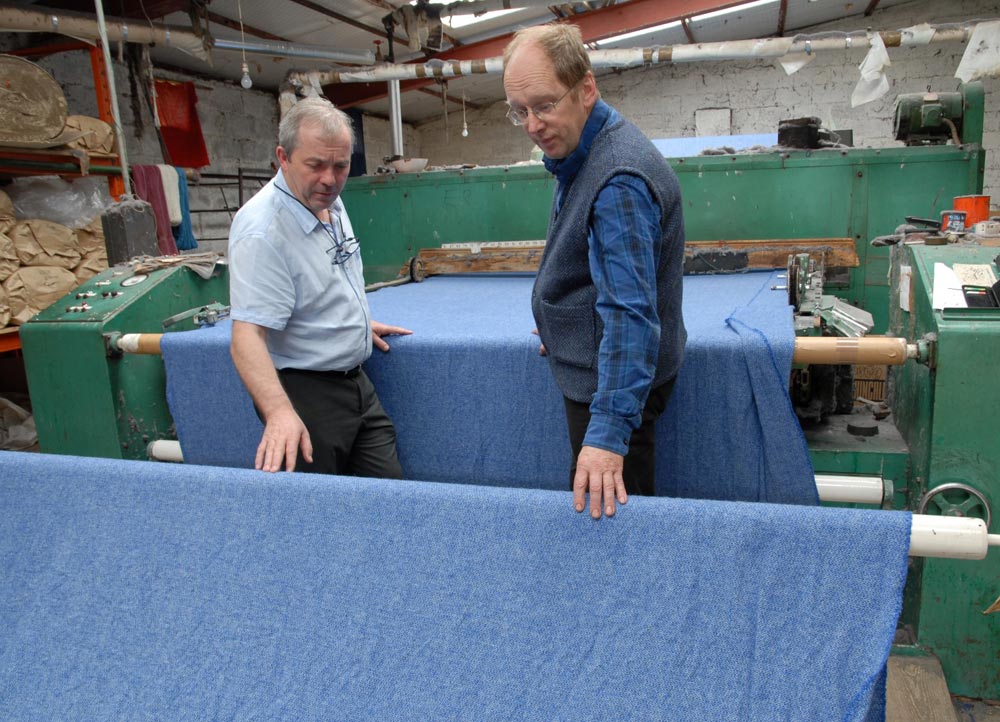 Gerry visiting our good friend & Master Weaver Andrew from the famous Kerry Woollen Mills to go through the weaving process of our stunning tweeds.
